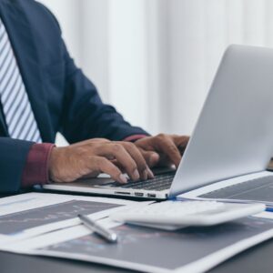 Person typing on a laptop