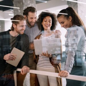 team of workers gathering around