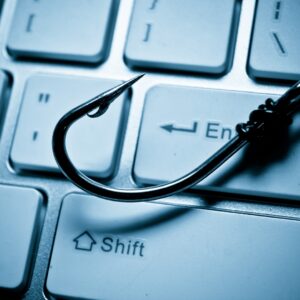 Fishing hook on a keyboard