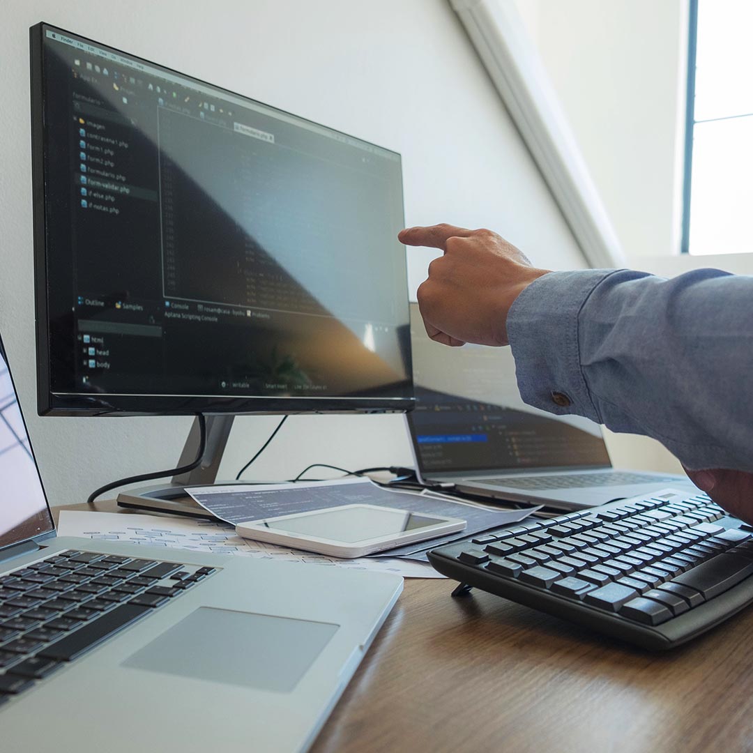 man using a computer at work