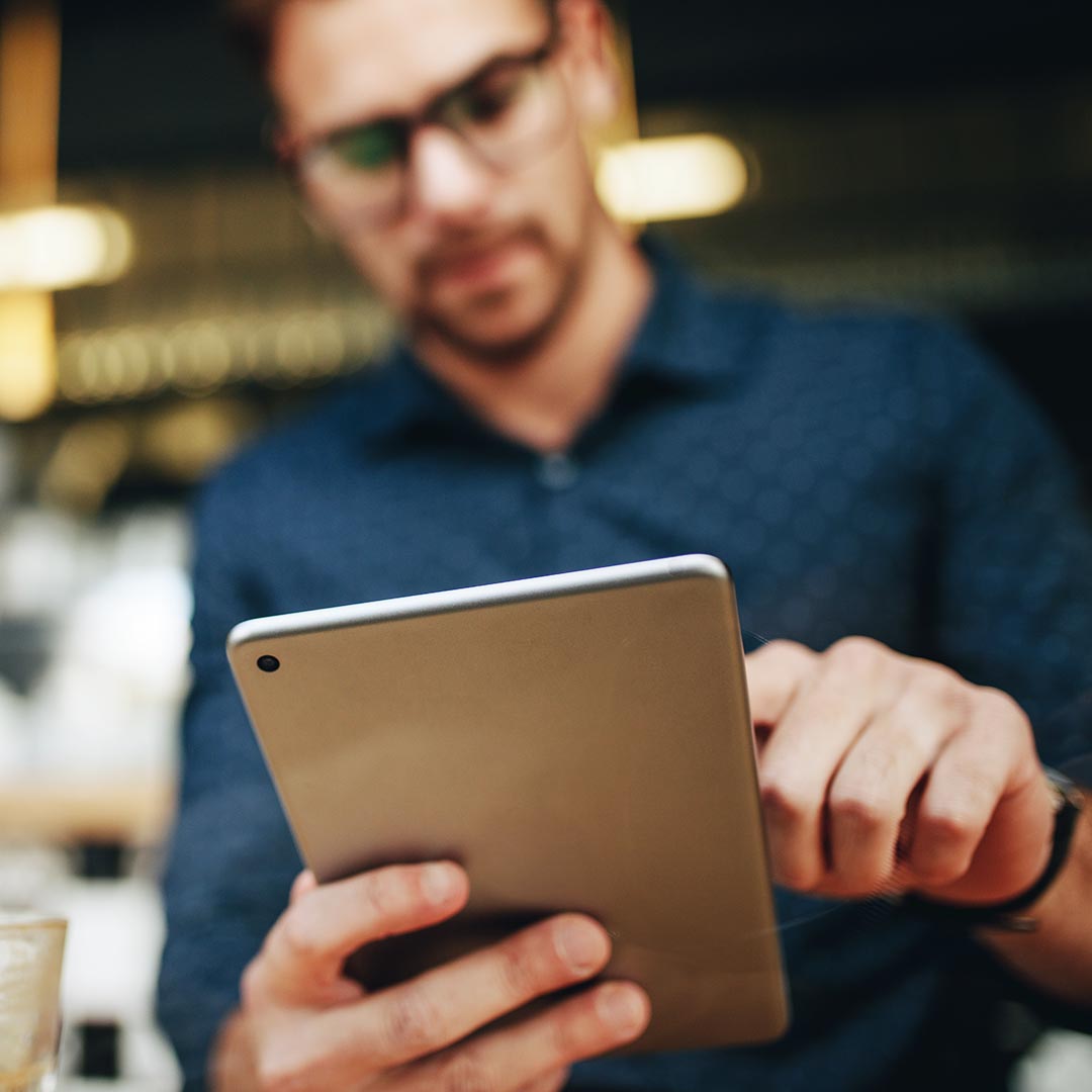 man at work using a tablet