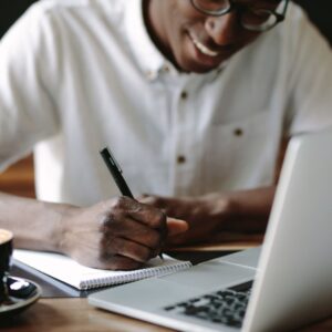 A worker writing something down