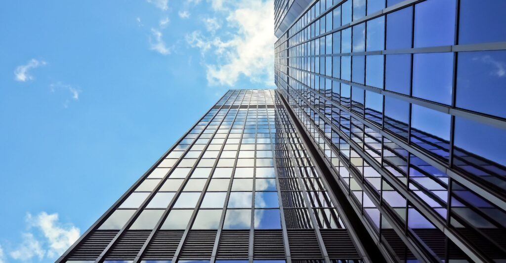 straight up side of glass exterior high rise building