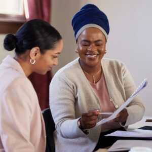 employees looking at paperwork